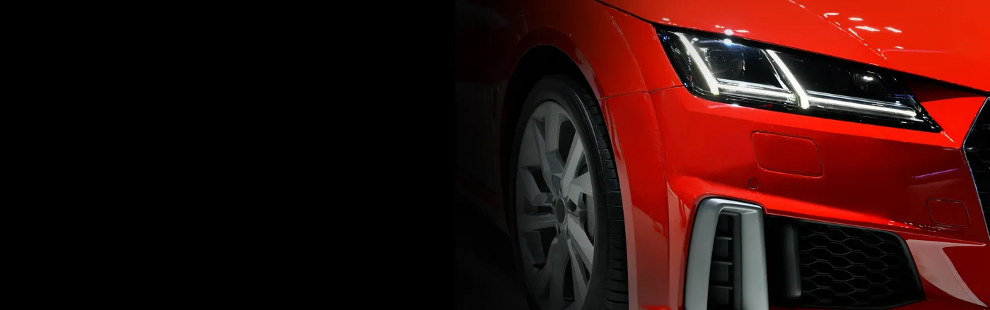 Red sports car, rear headlight detail